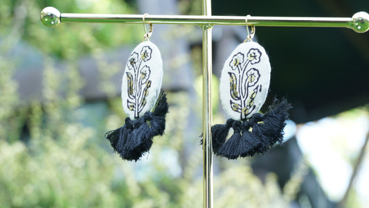 Black and white earrings with tassels